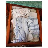 Dishrags and contents of drawer