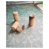 3 tiny pet milk cans in wood containers