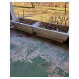 Pair of cement planters approx 26 inches long and