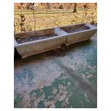 Pair of cement planters approx 26 inches long and