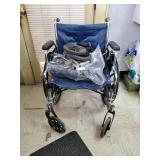Invacare wheelchair with attachments