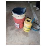 Stack of buckets and a sprayer