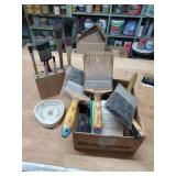 Group of paint brushes and a thermometer