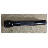Mag light flashlight. Approx 12 inches long.