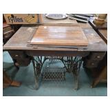 Singer sewing machine in rough condition