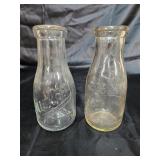 Quality Milk bottle and unmarked bottle.