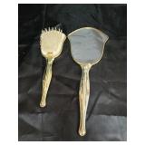 Brush and mirror dresser set.