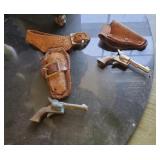 Miniature cap guns and holsters