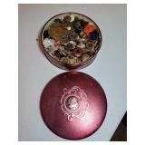 Swiss colony tin full of buttons