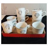 Group of 8 stoneware coffee mugs