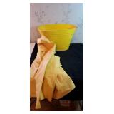 Yellow metal container and size small rain jacket