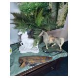 Pair of horses, plant and an arrowhead