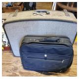 Big suitcase and computer bag