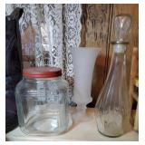 Old red lid jar, vase and a decanter