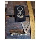 Mercedes key chain and a pocket knife
