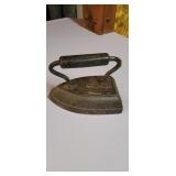 Antique iron marked with an 8