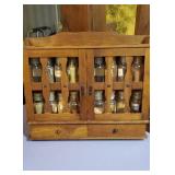 Vintage spice rack with glass bottles