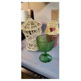 Cute gazebo, green glass and a candle