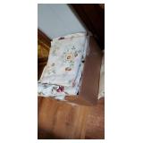 Box of freshly washed King size sheets