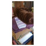 Box of full sized sheets and a blanket