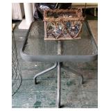 Little patio table and basket of pebbles