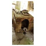 Handmade dog house and stuff on top