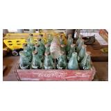 24 Coca-Cola bottles in Coke crate and Pepsi