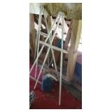 Pair of easels and a fuel can 5 gallon