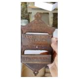 Cast iron match holder and veggie cutter