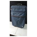 Rolling luggage piece by American tourister