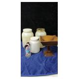 Plastic jugs and a compote