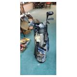 Golf clubs a few with wood handles