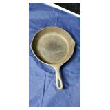 Cast  iron skillet marked 6