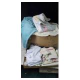 Big box of blankets and some dish towels