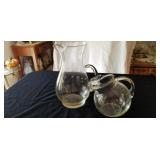 Etched glass pitchers with floral design