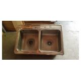 Stainless steel sink approx size is 22 x 33