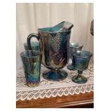 Carnival glass pitcher with 2 stems and 2 glasses