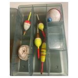 Fishing tackle case with bobbers