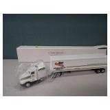 (2) ERTL 1/64 Semis & Trailers
