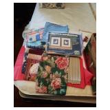 ASSORTMENT OF MATERIALS AND A CRAFT ITEM