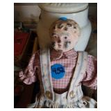 VINTAGE DOLL WITH A TIN HEAD AND PORCELAIN HANDS