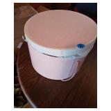 PINK HAT BOX WITH VARIOUS YARNS INSIDE