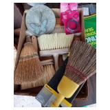 BOX OF BROOMS AND BRUSHES WIRE AND A SUN DIAL