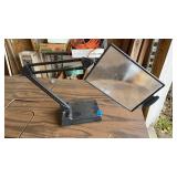 MAGNIFYING GLASS ON A STAND