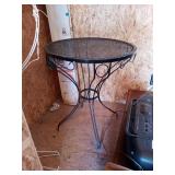 BLACK IRON OUTDOOR TABLE  28 INCHES TALL AND 24