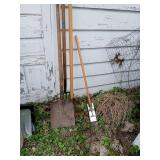 ONE RAKE ONE PICK ONE FLAT AHOVEL AND WEED PULLER