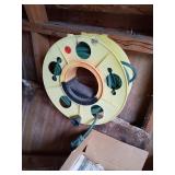 EXTENSION CORD ON A REEL