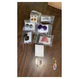 7 PAIRS OF PIERCED EARRINGS AND 1 MATCHING