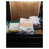 SEVERAL TABLE CLOTHES AND 5 HAND TOWELS