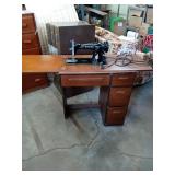 SINGER SEWING MACHINE IN A CABINET